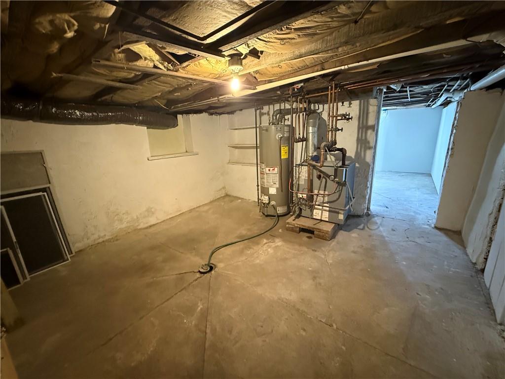243 South Sycamore Street Mount Pleasant, PA 15666 - Photo 17 of 27 a view of a garage with wooden floors