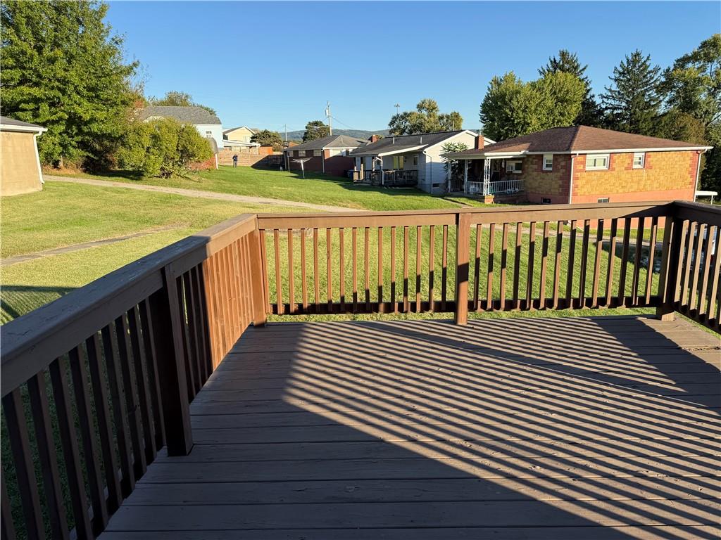 243 South Sycamore Street Mount Pleasant, PA 15666 - Photo 23 of 27 a view of a street with wooden fence