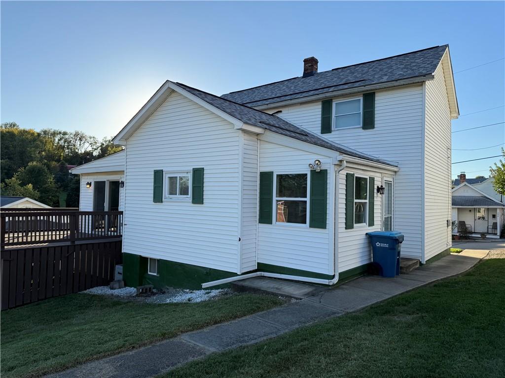 243 South Sycamore Street Mount Pleasant, PA 15666 - Photo 27 of 27 a front view of a house with garden