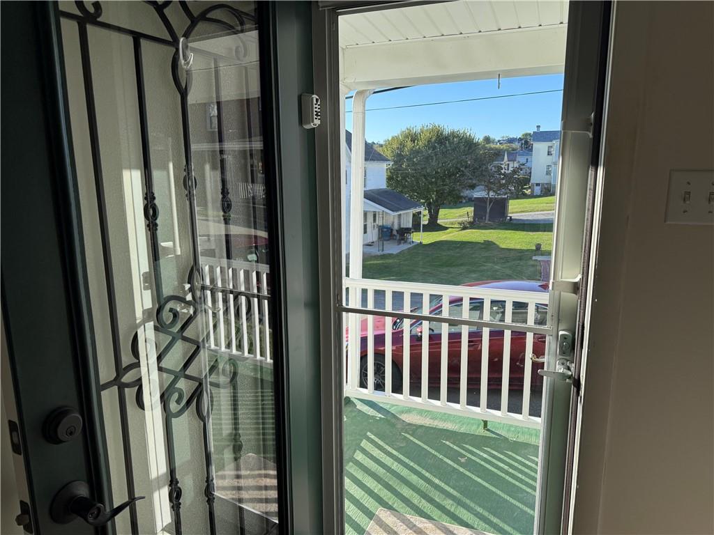 243 South Sycamore Street Mount Pleasant, PA 15666 - Photo 3 of 27 a view of a balcony
