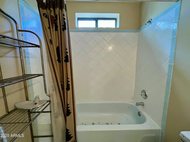 a bathroom with a bathtub