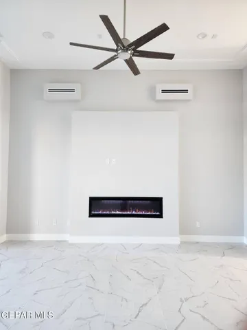 a view of a ceiling fan in a room
