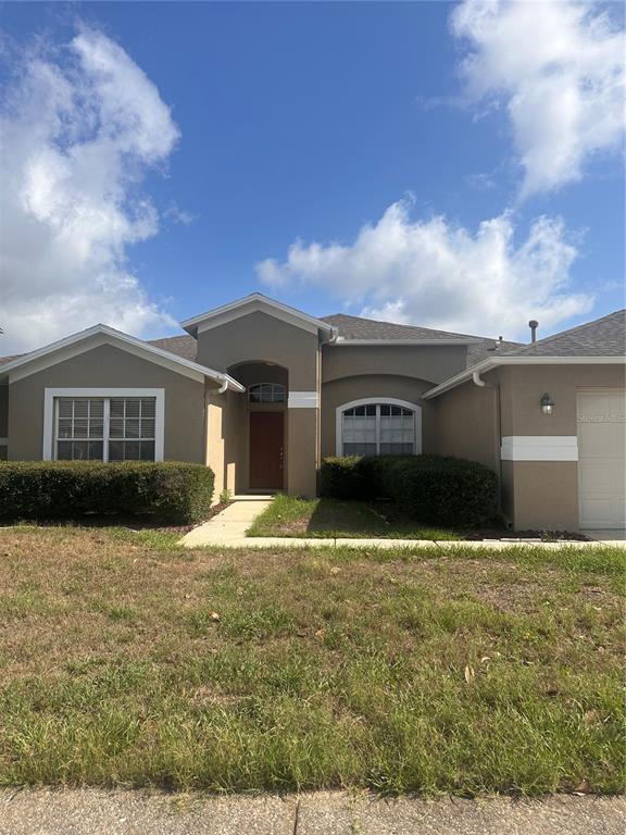 4347 Brandon Ridge Drive Valrico, FL 33594 - Photo 13 of 13 a front view of a house with a yard