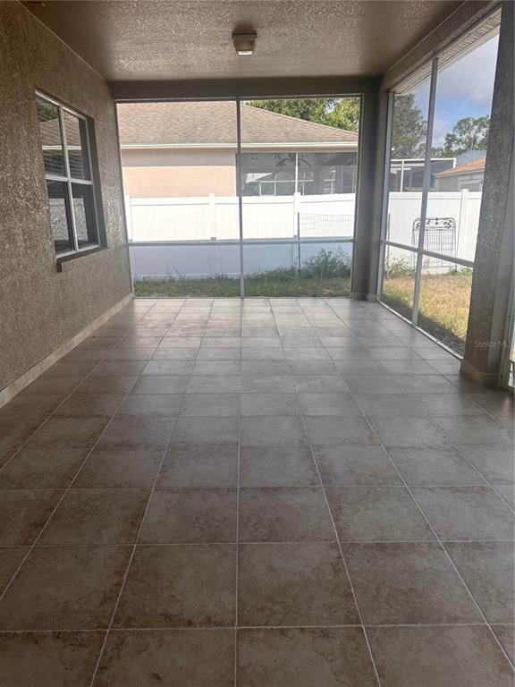 4347 Brandon Ridge Drive Valrico, FL 33594 - Photo 7 of 13 a view of an empty room with a window