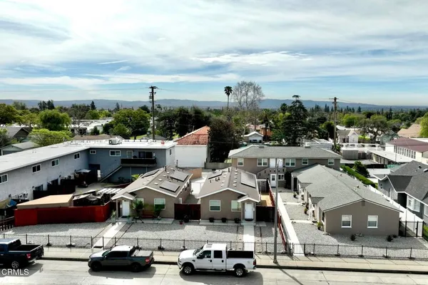 an aerial view of a building with outdoor space