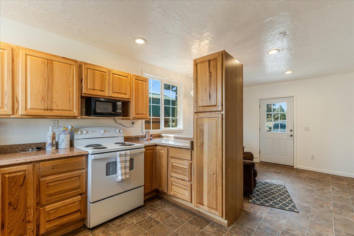 16963 Southwest Bullhead Road Terrebonne, OR 97760 - Photo 22 of 26 ADU Kitchen:FrontDoor