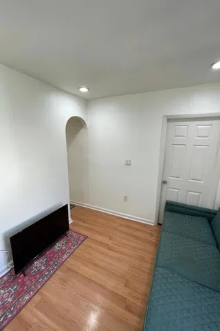 a bed room with a bed and a window