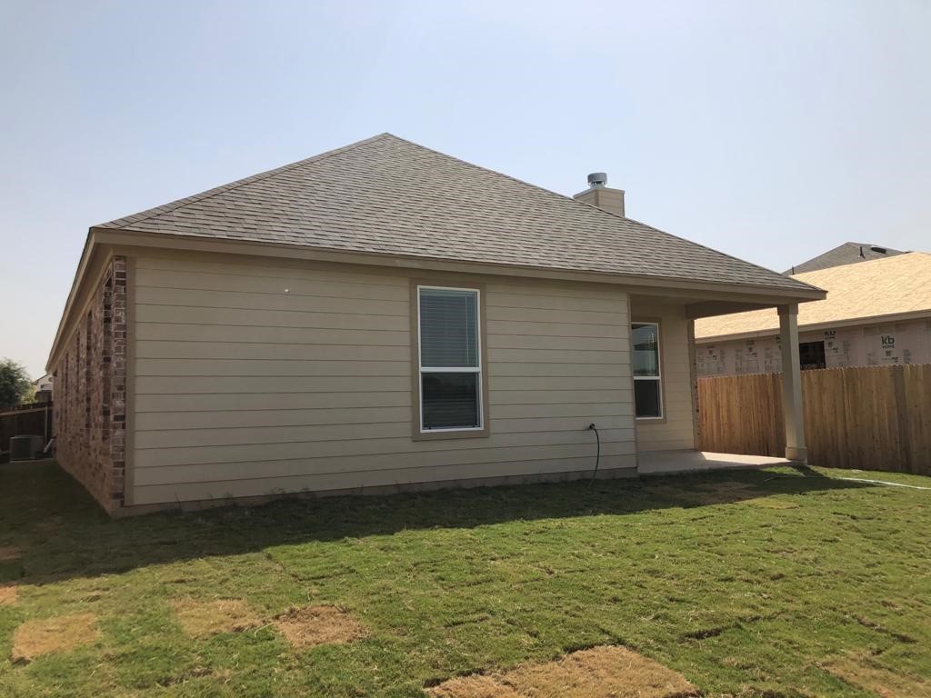 17110 Gibbons Path Round Rock, TX 78664 - Photo 12 of 12 a backyard of a house