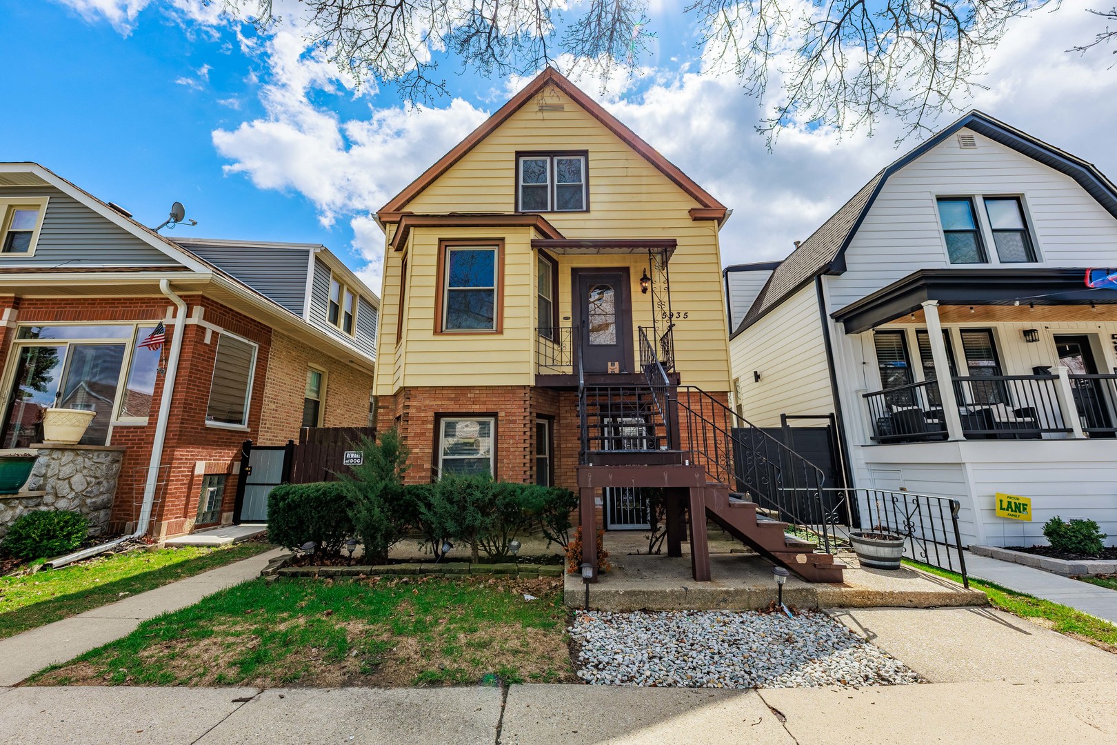 5935 West Patterson Avenue Chicago, IL 60634 - Photo 1 of 34 a front view of a house with garden