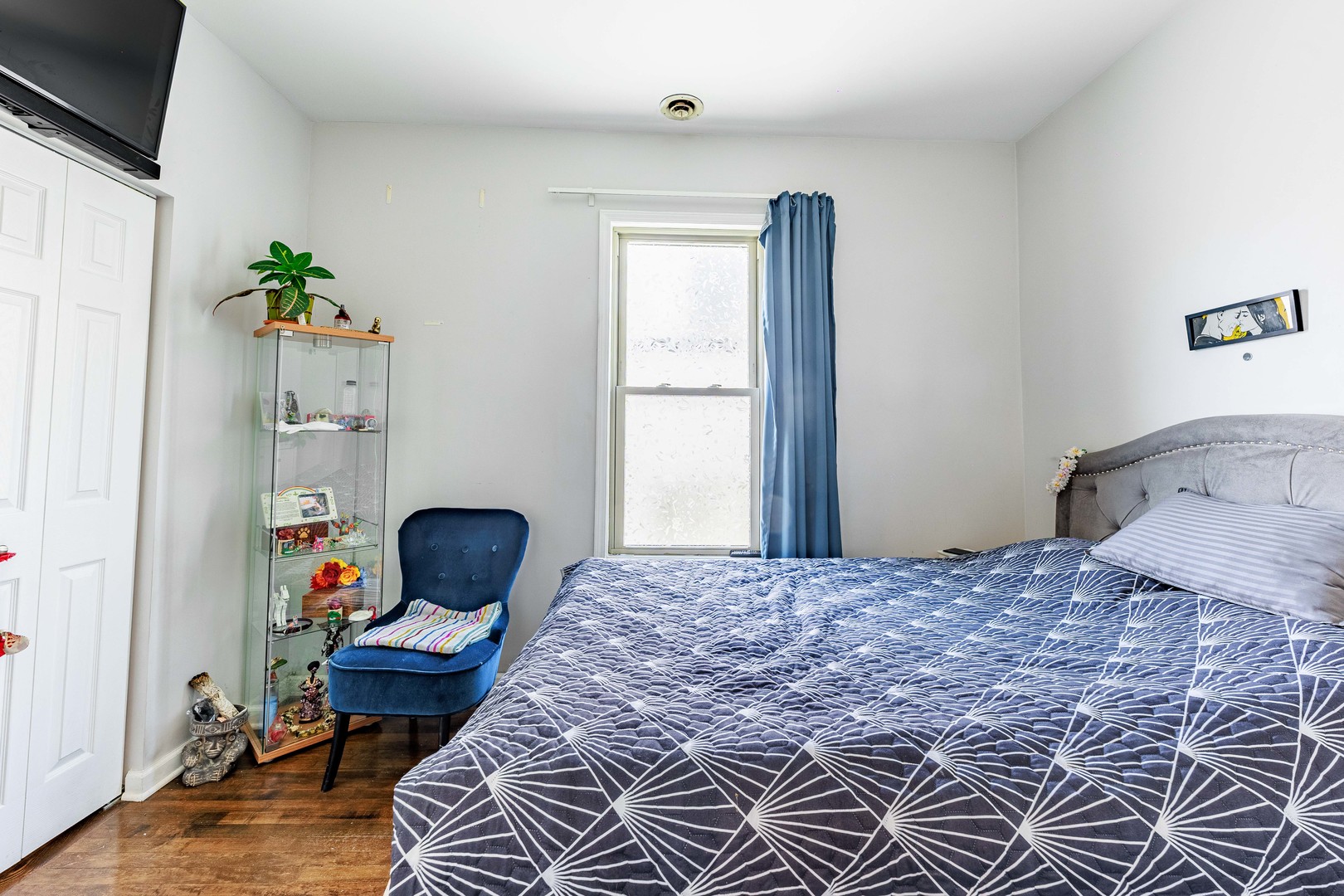 5935 West Patterson Avenue Chicago, IL 60634 - Photo 15 of 34 a bedroom with a bed and wooden floor