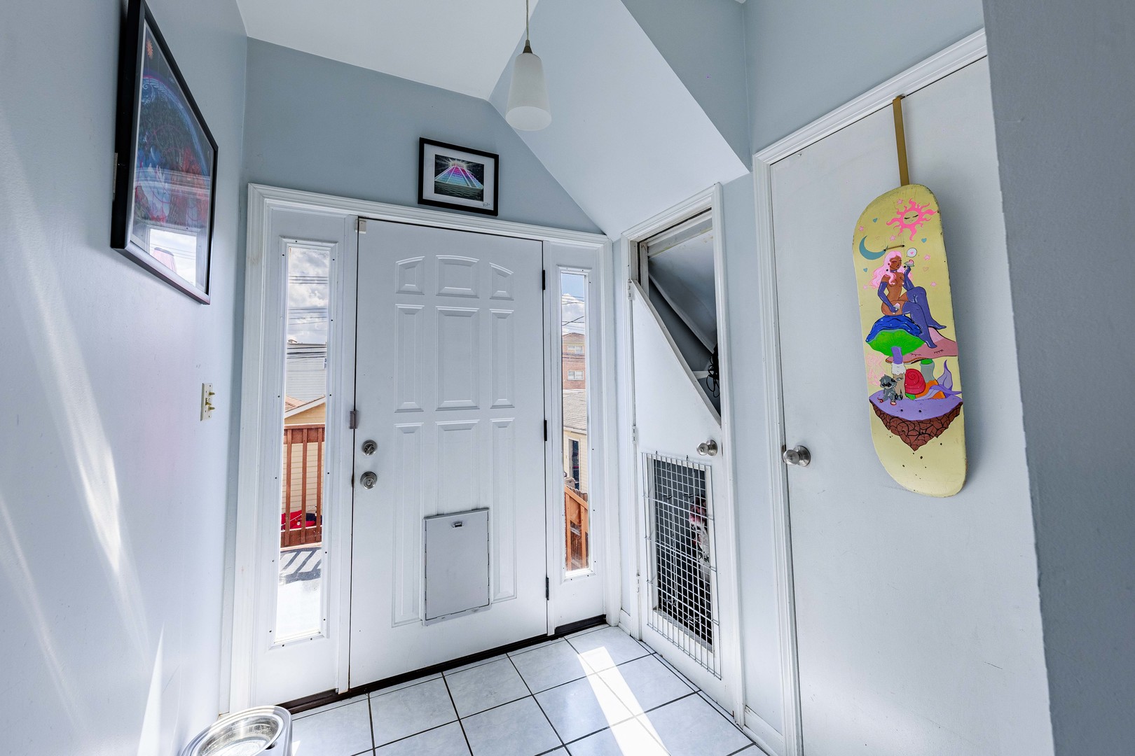 5935 West Patterson Avenue Chicago, IL 60634 - Photo 17 of 34 a hallway with a dining table and cabinets