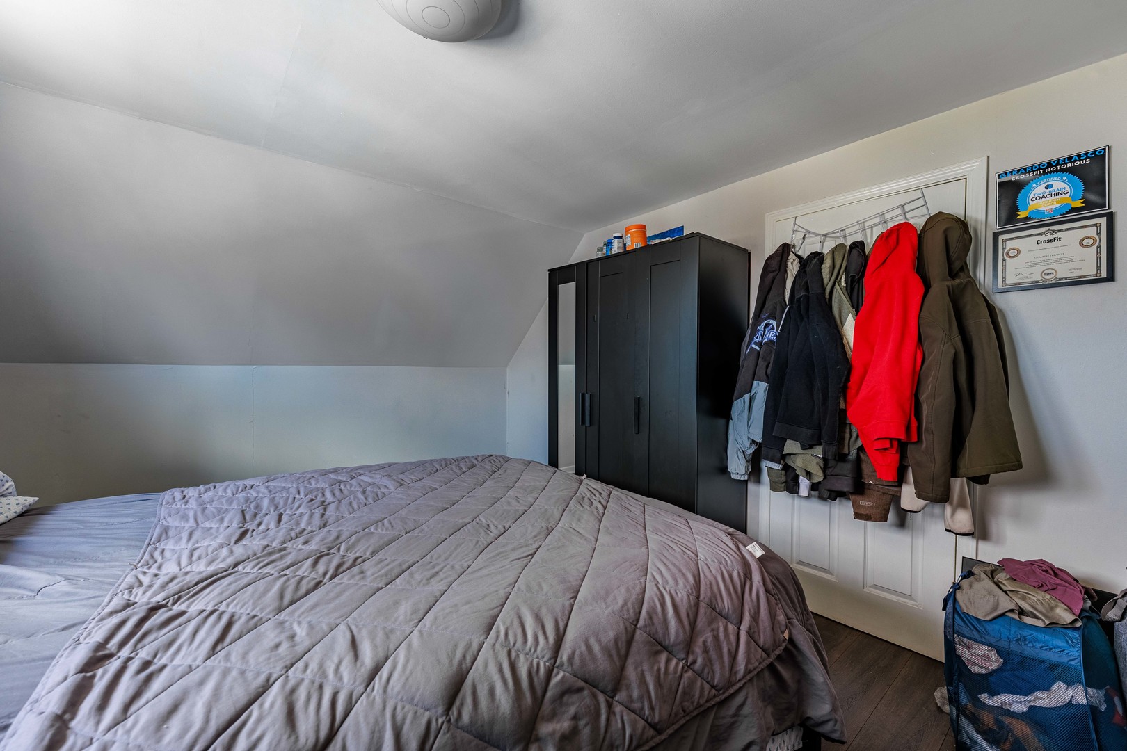 5935 West Patterson Avenue Chicago, IL 60634 - Photo 19 of 34 a bedroom with a bed and a walk in closet