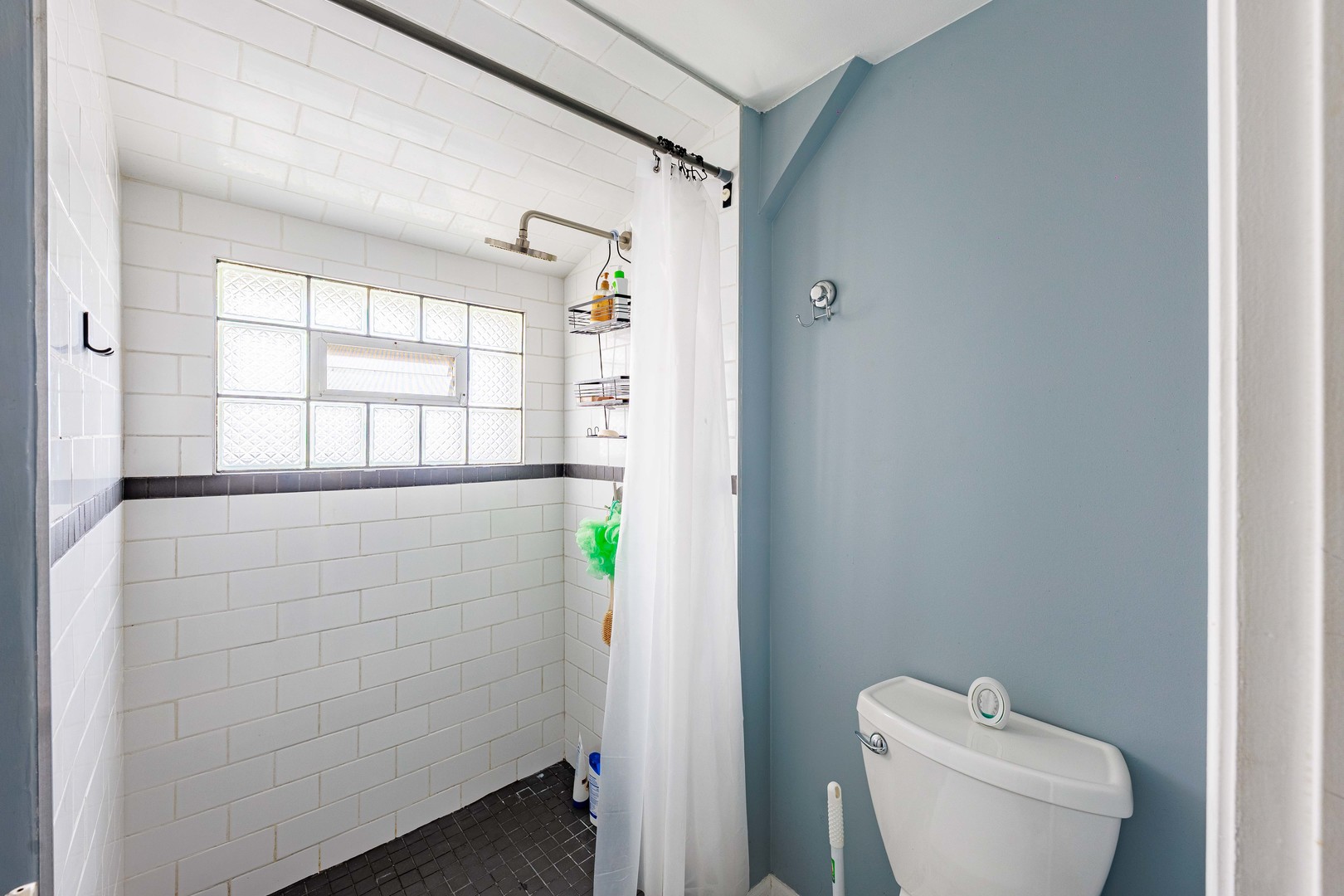 5935 West Patterson Avenue Chicago, IL 60634 - Photo 21 of 34 a bathroom with a toilet and a window