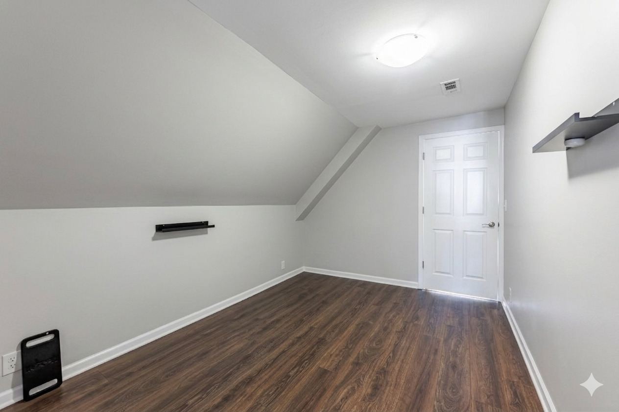 5935 West Patterson Avenue Chicago, IL 60634 - Photo 24 of 34 an empty room with wooden floor and windows
