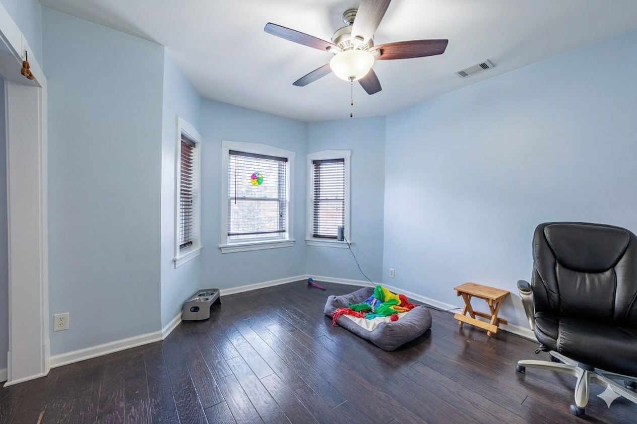5935 West Patterson Avenue Chicago, IL 60634 - Photo 28 of 34 a room with furniture and a window