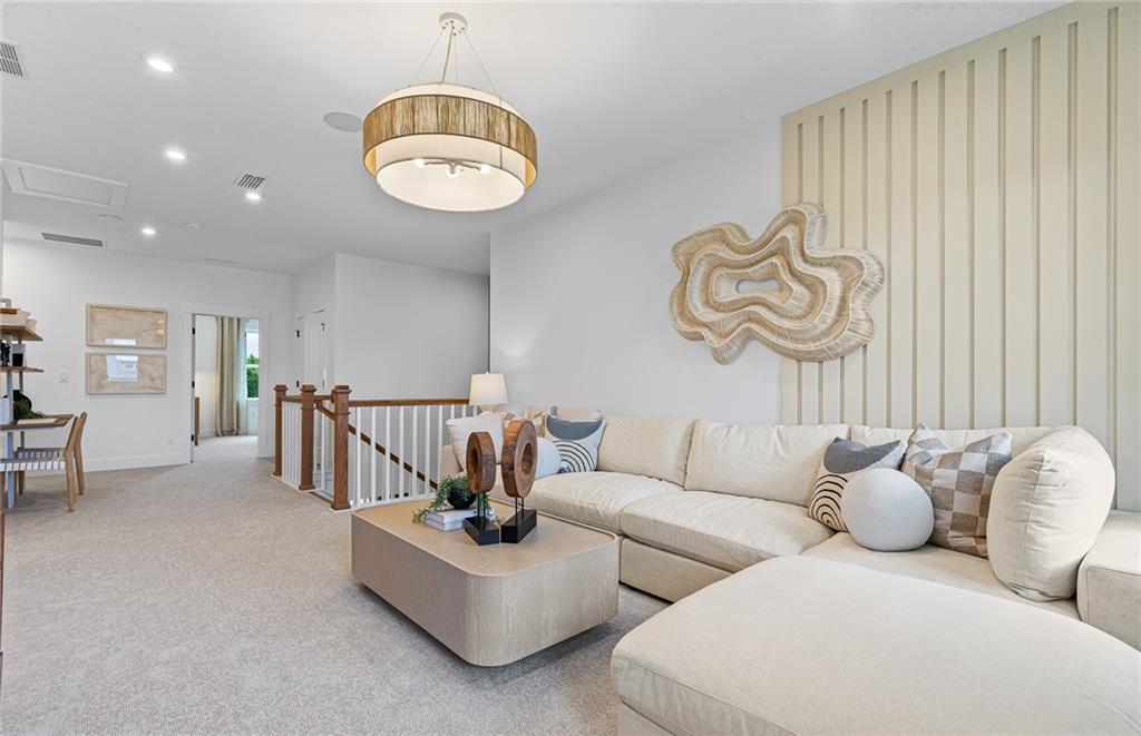 299 Rockledge Bend Powder Springs, GA 30127 - Photo 12 of 12 a living room with furniture and a large window