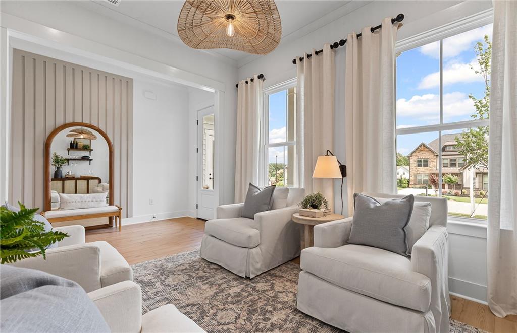 299 Rockledge Bend Powder Springs, GA 30127 - Photo 3 of 12 a living room with furniture and a large window