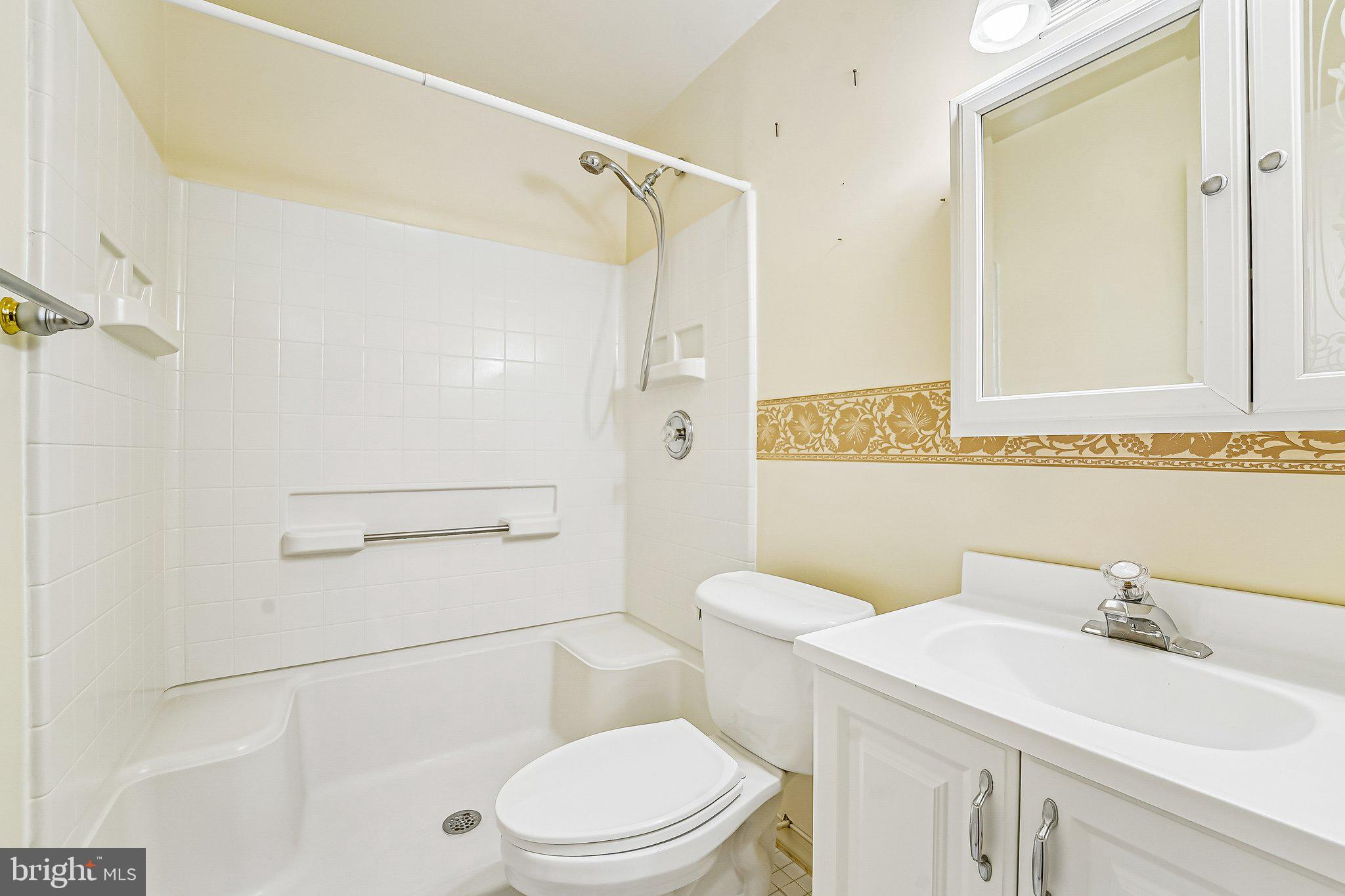 2422 Rippling Brook Road Frederick, MD 21701 - Photo 30 of 35 a bathroom with a sink a toilet and shower