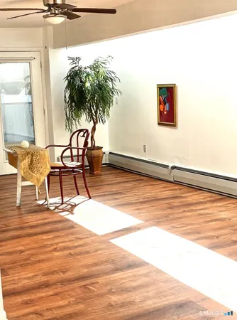 a swimming pool with chair and table