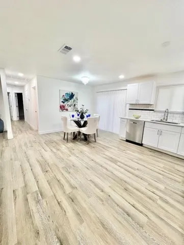 a large room with wooden floor