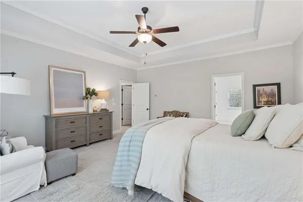 a living room with a sink and a window