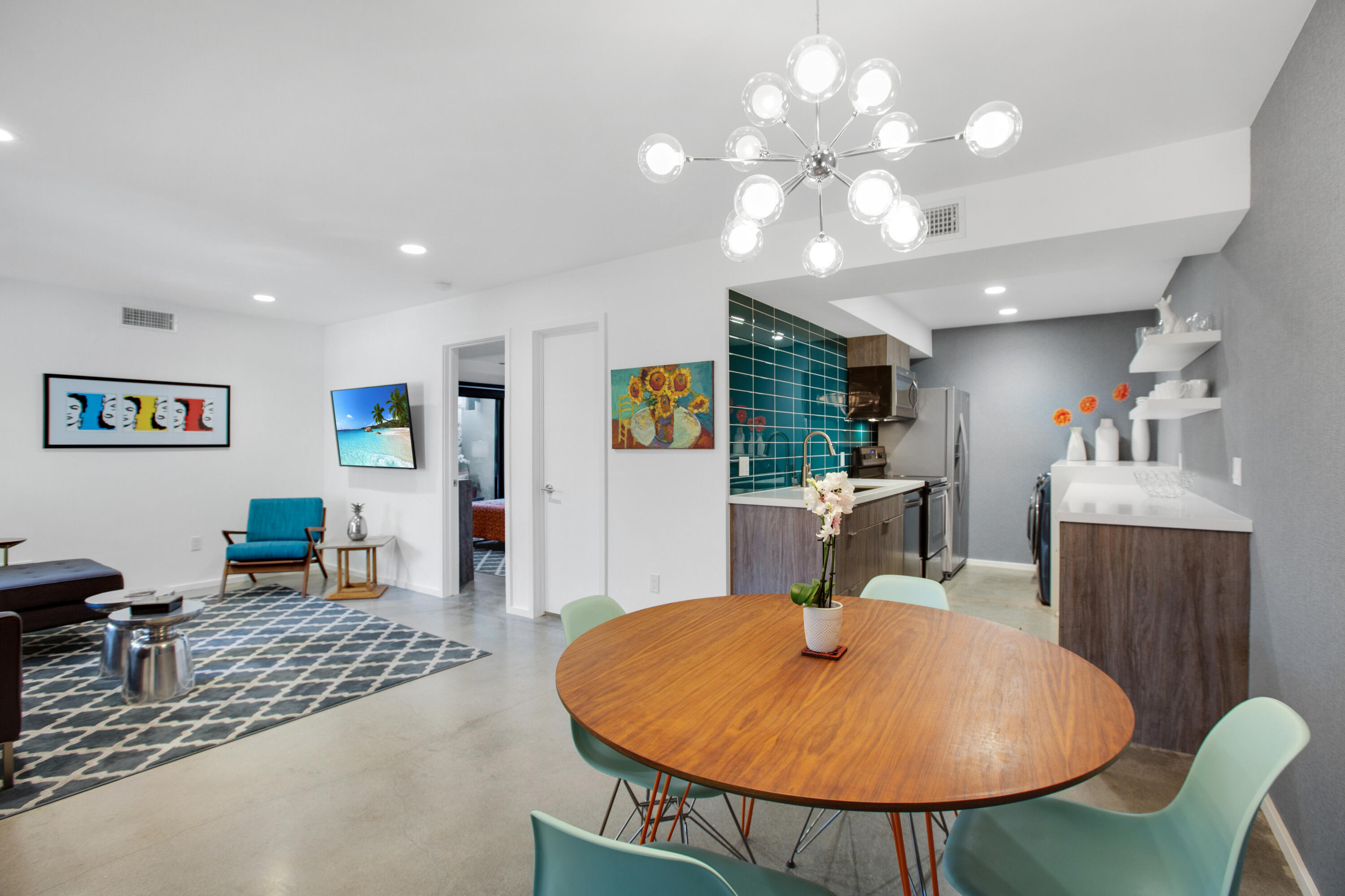 353 North Hermosa Drive, Unit 10A1 Palm Springs, CA 92262 - Photo 14 of 28 a living room with dining room and wooden floor