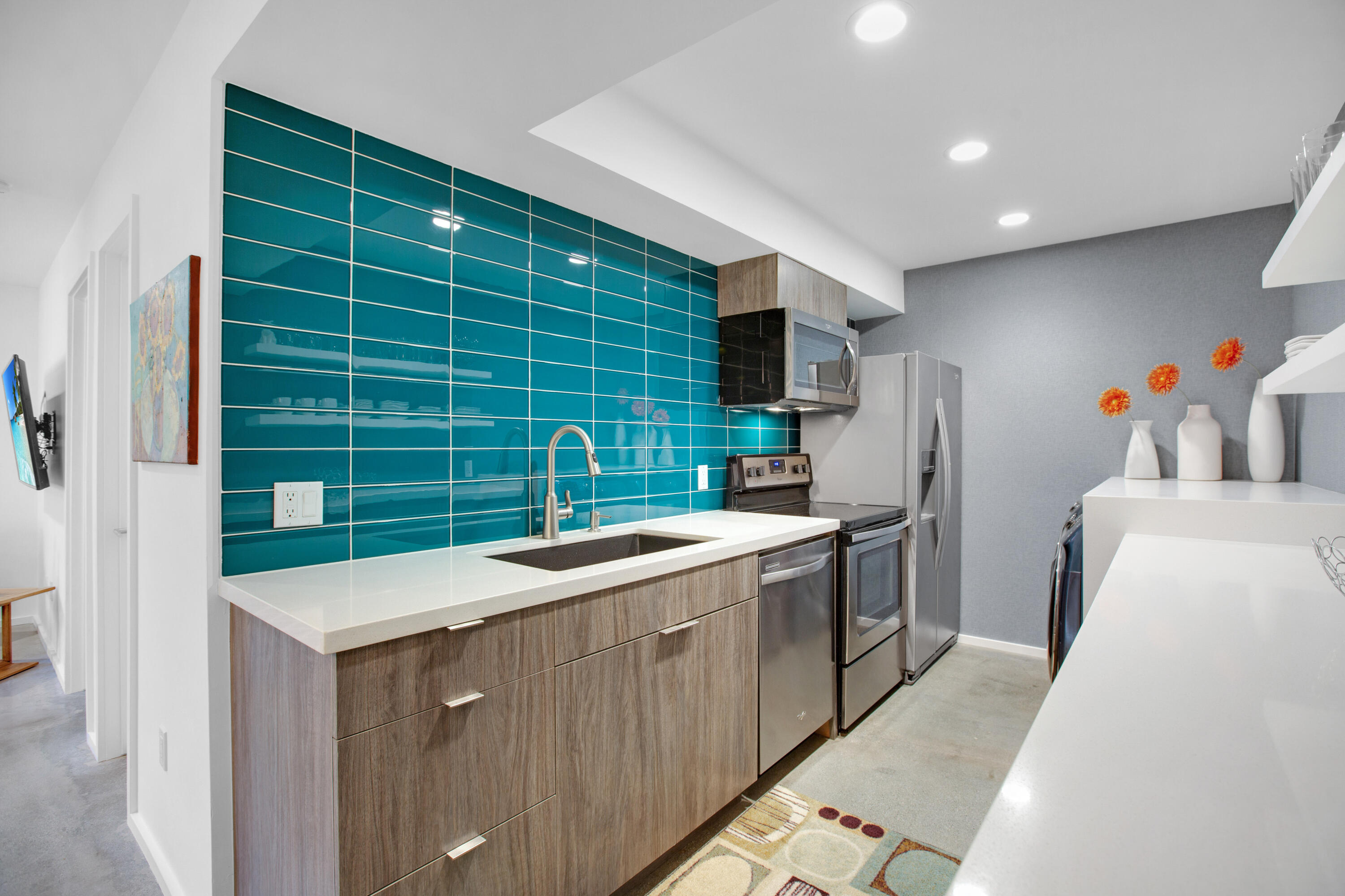 353 North Hermosa Drive, Unit 10A1 Palm Springs, CA 92262 - Photo 15 of 28 a kitchen with a sink stove and refrigerator