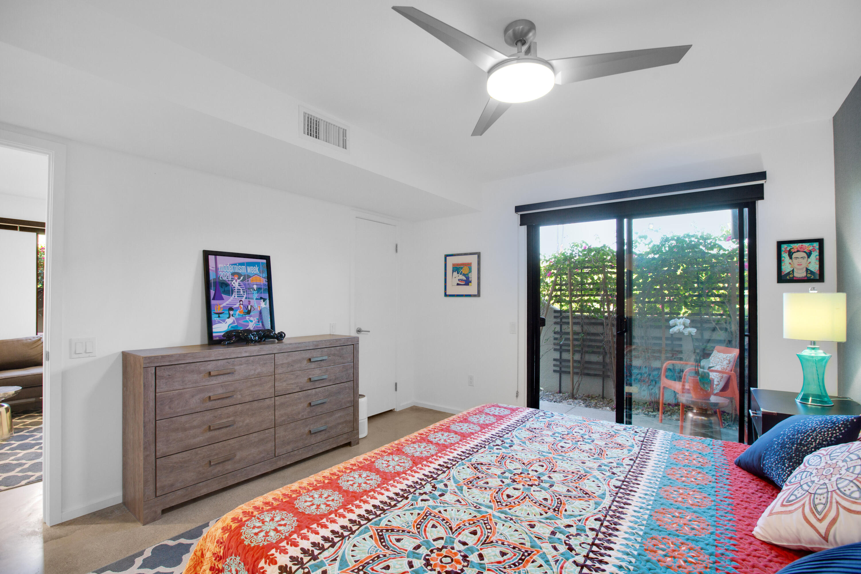 353 North Hermosa Drive, Unit 10A1 Palm Springs, CA 92262 - Photo 19 of 28 a bed room with a bed and a dresser