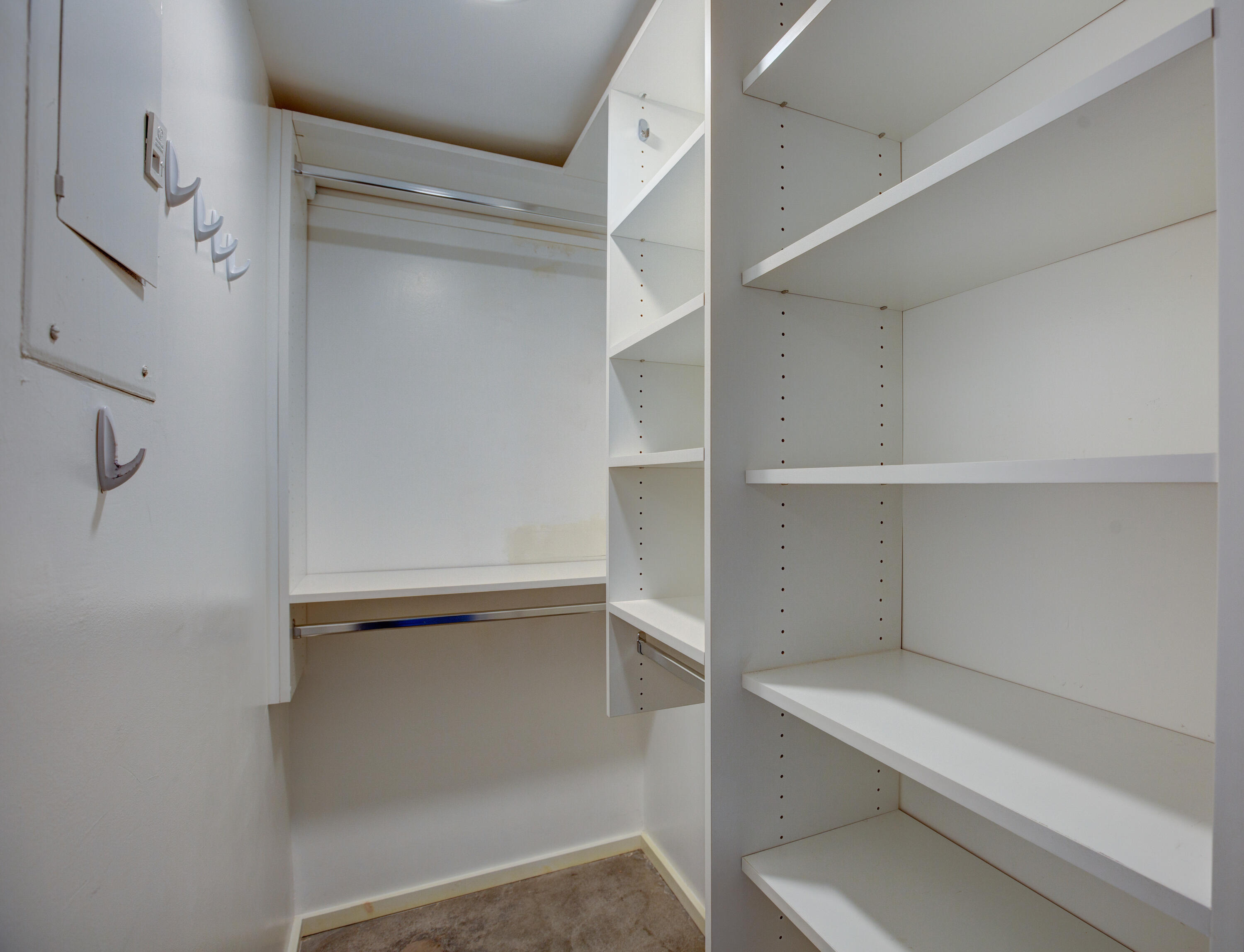 353 North Hermosa Drive, Unit 10A1 Palm Springs, CA 92262 - Photo 21 of 28 a view of walk in closet with empty racks