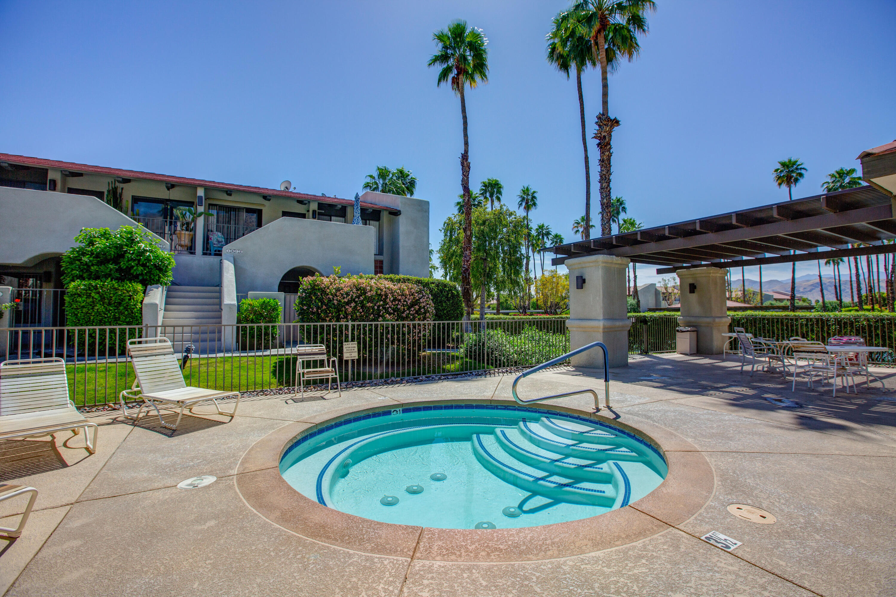 353 North Hermosa Drive, Unit 10A1 Palm Springs, CA 92262 - Photo 25 of 28 a swimming pool with outdoor seating yard and barbeque oven