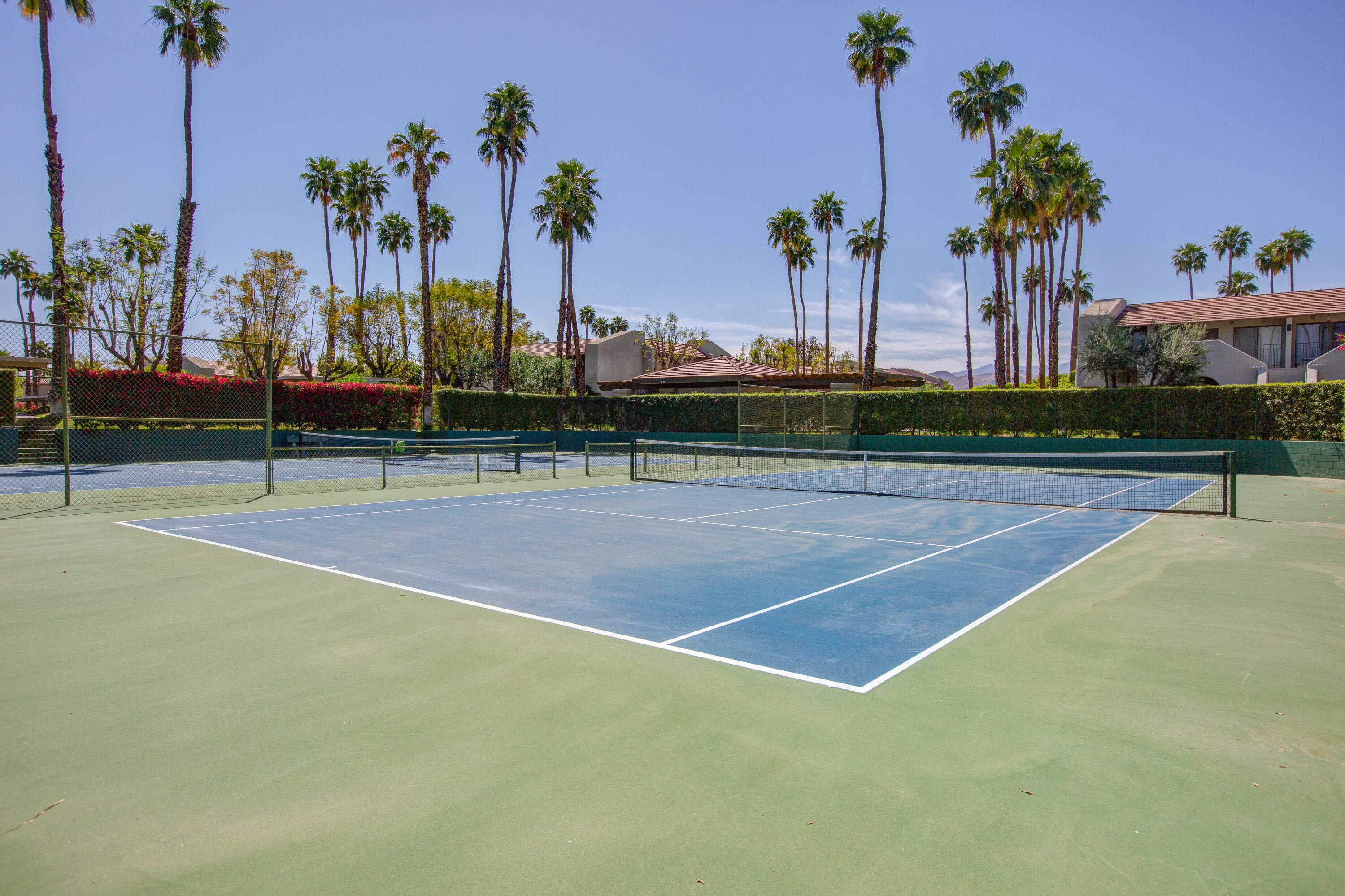 353 North Hermosa Drive, Unit 10A1 Palm Springs, CA 92262 - Photo 26 of 28 a view of a tennis court
