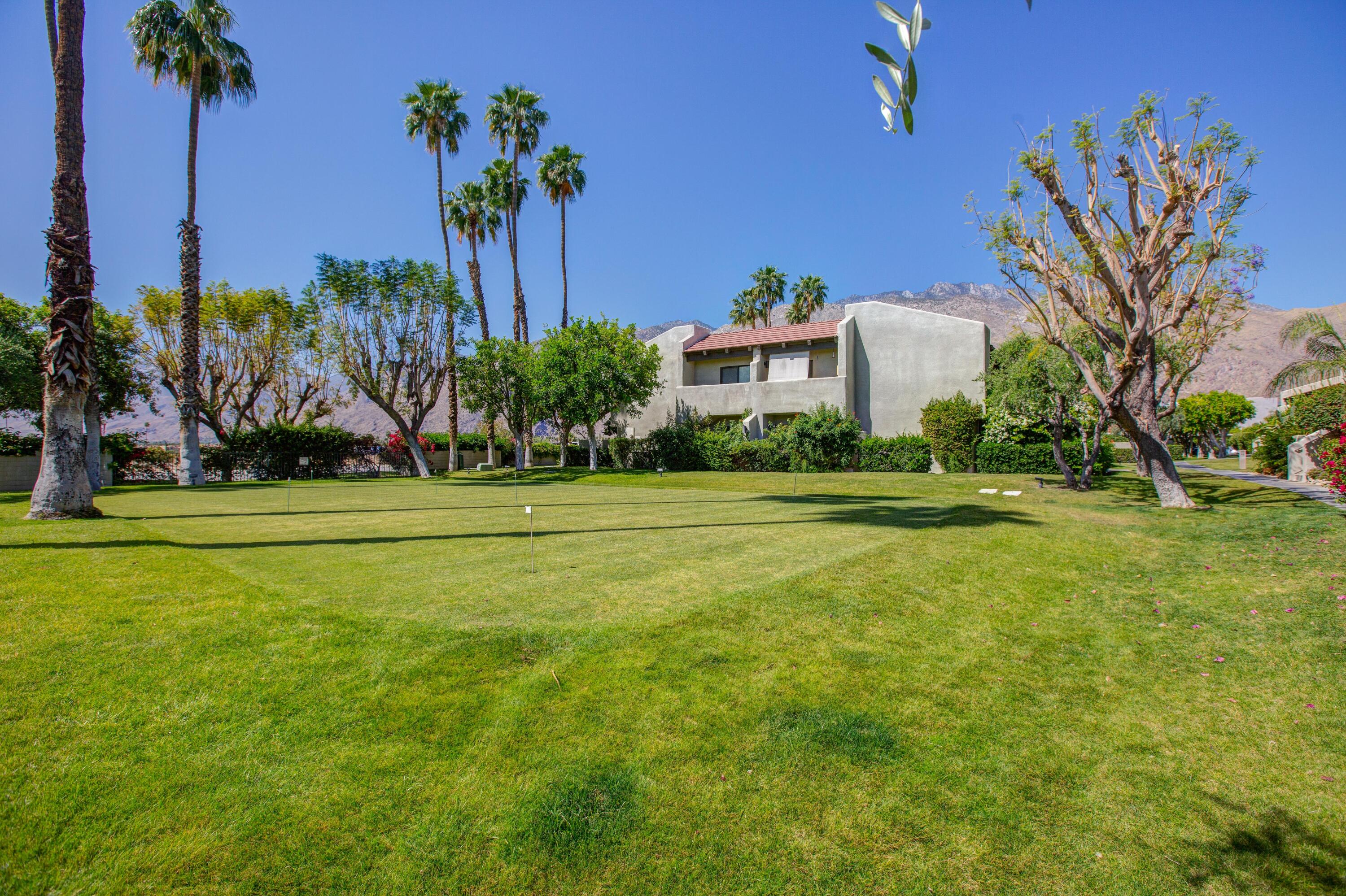 353 North Hermosa Drive, Unit 10A1 Palm Springs, CA 92262 - Photo 27 of 28 a view of a volley ball court