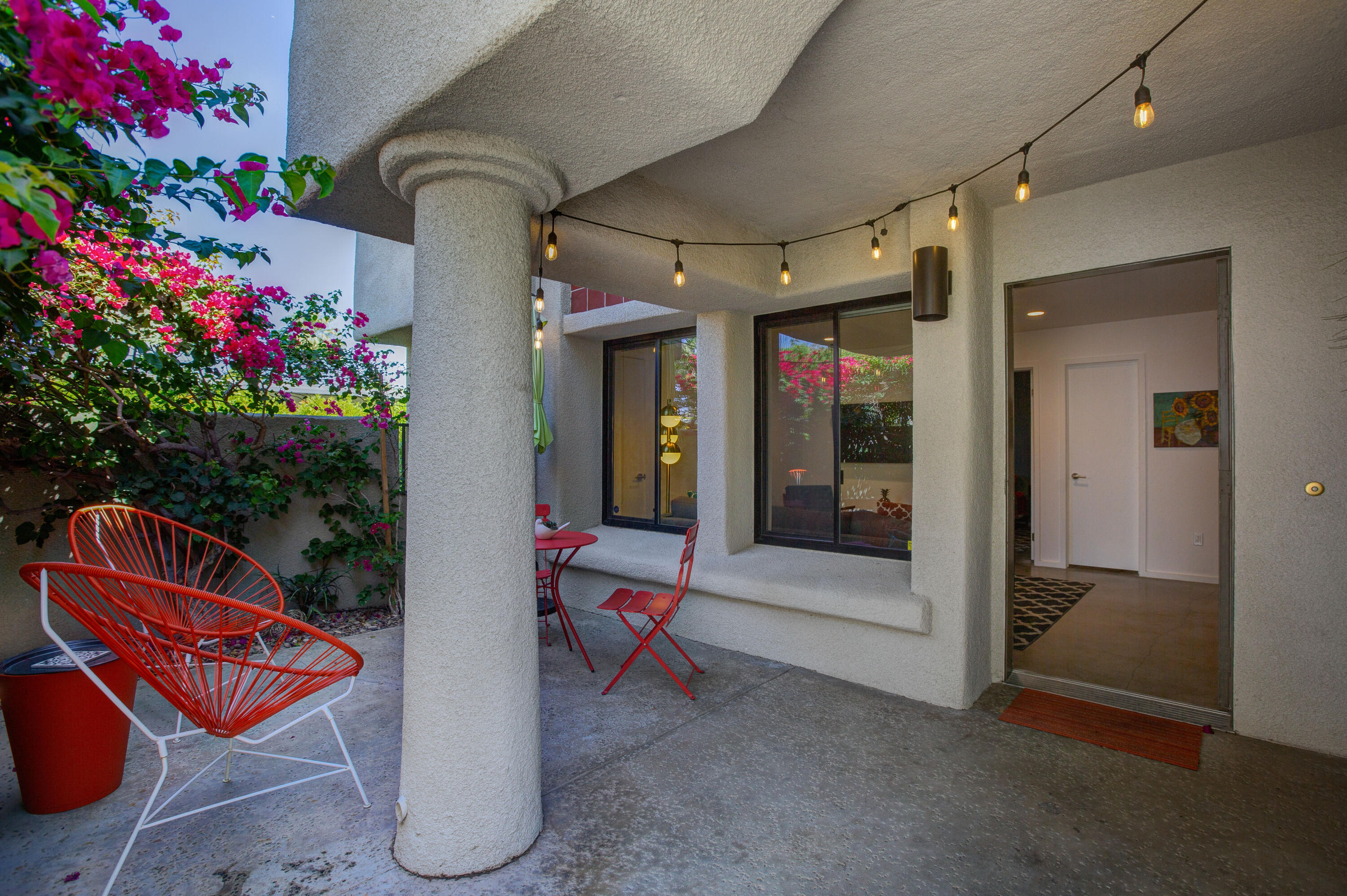 353 North Hermosa Drive, Unit 10A1 Palm Springs, CA 92262 - Photo 3 of 28 a outdoor space with chairs and potted plants