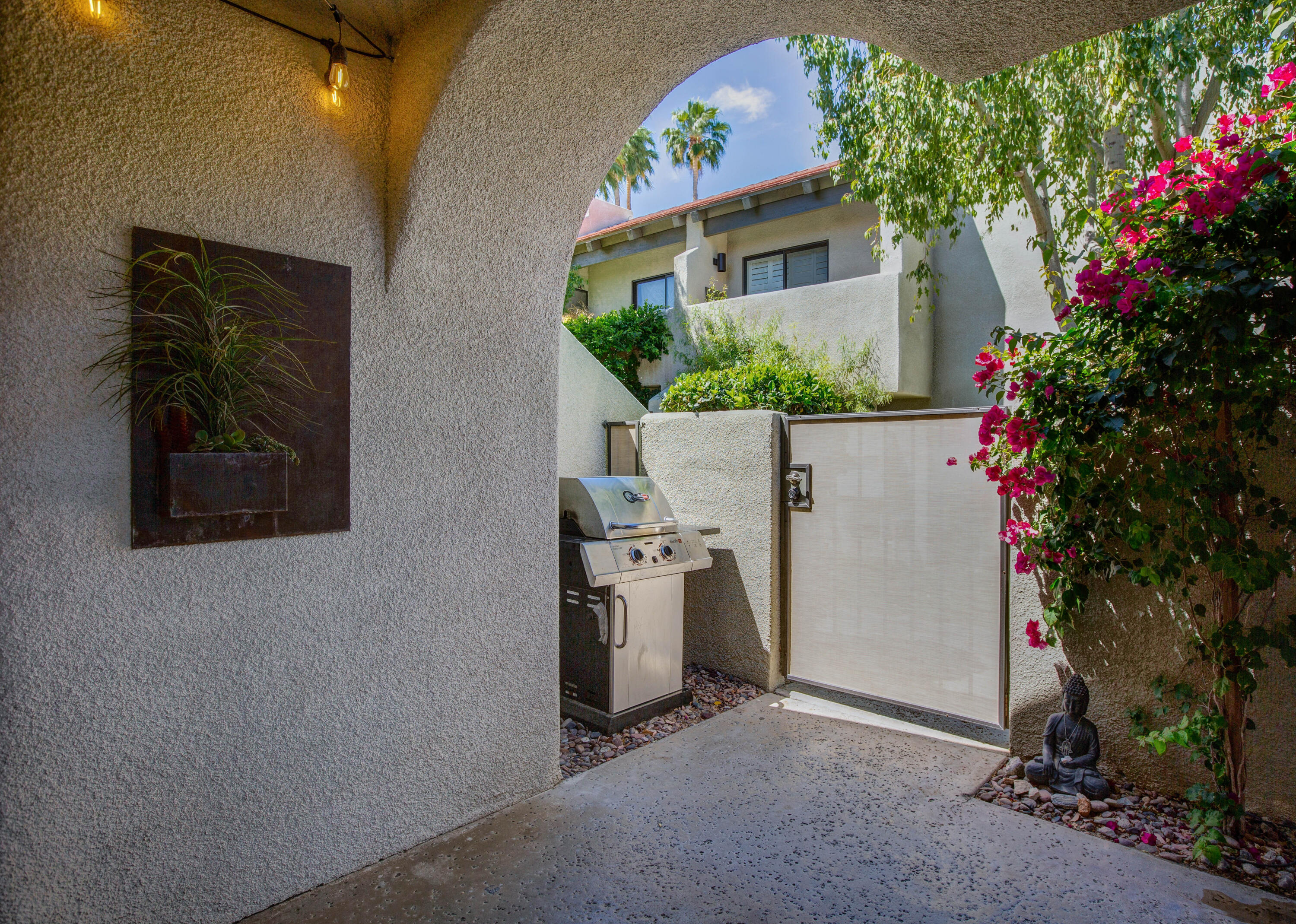 353 North Hermosa Drive, Unit 10A1 Palm Springs, CA 92262 - Photo 6 of 28 a view of a house with a flower garden