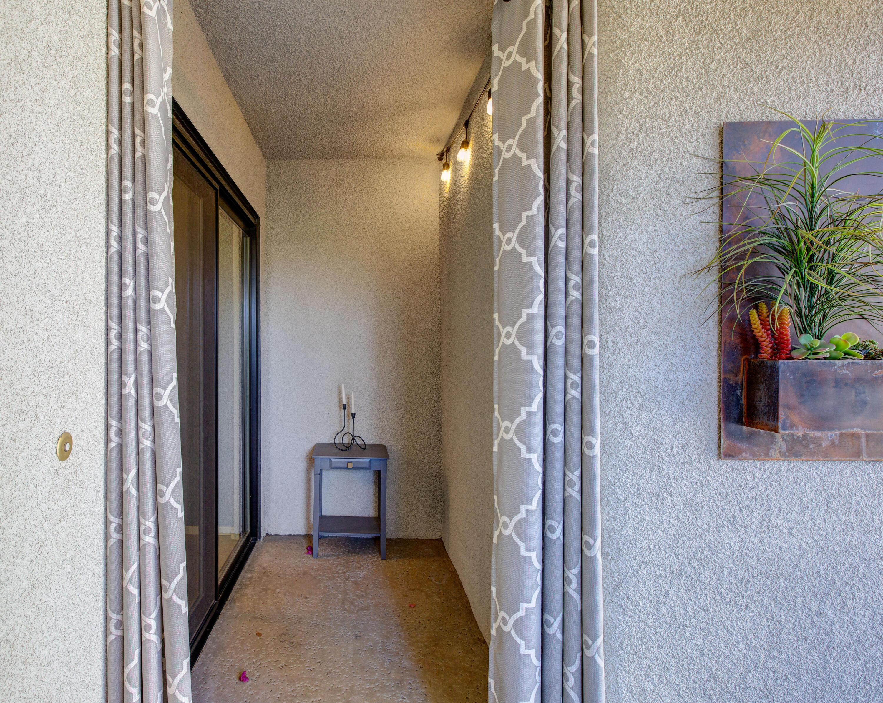 353 North Hermosa Drive, Unit 10A1 Palm Springs, CA 92262 - Photo 7 of 28 a view of a hallway to a livingroom and a hallway