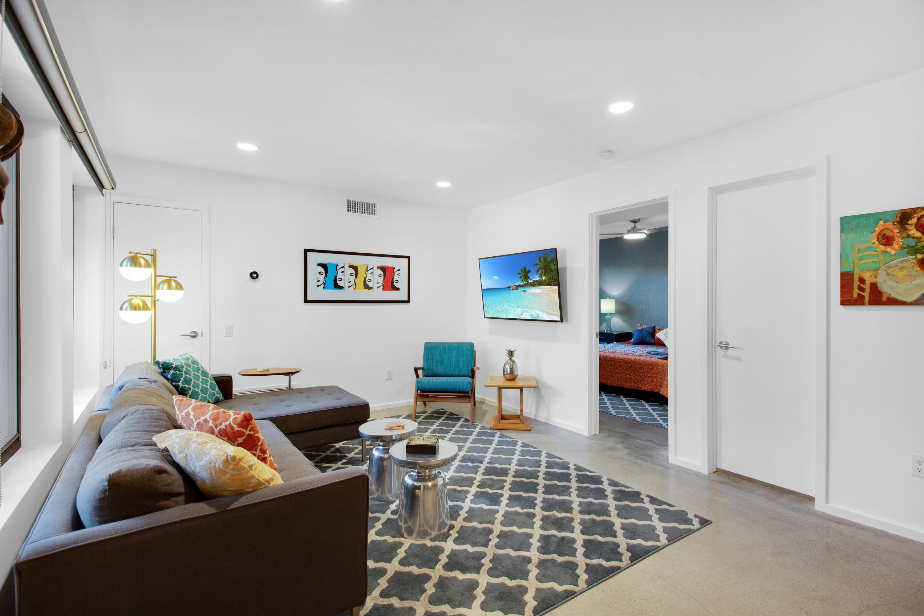 353 North Hermosa Drive, Unit 10A1 Palm Springs, CA 92262 - Photo 9 of 28 a living room with furniture and a rug