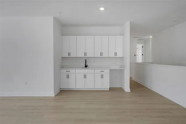 a view of a livingroom and window