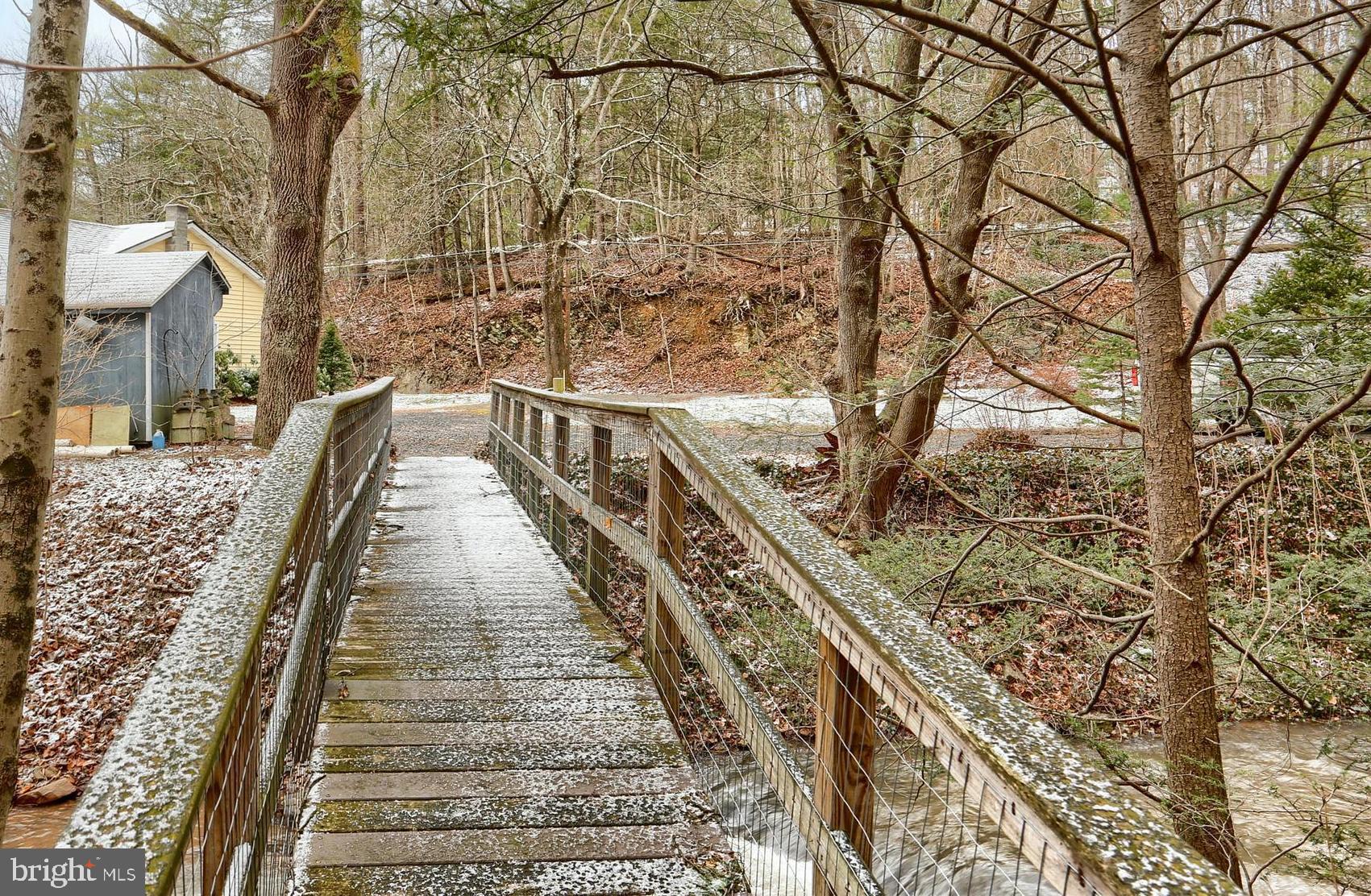 40 Meadow Grove Road Newport, PA 17074 - Photo 13 of 24 Walking bridge to main cabin ac