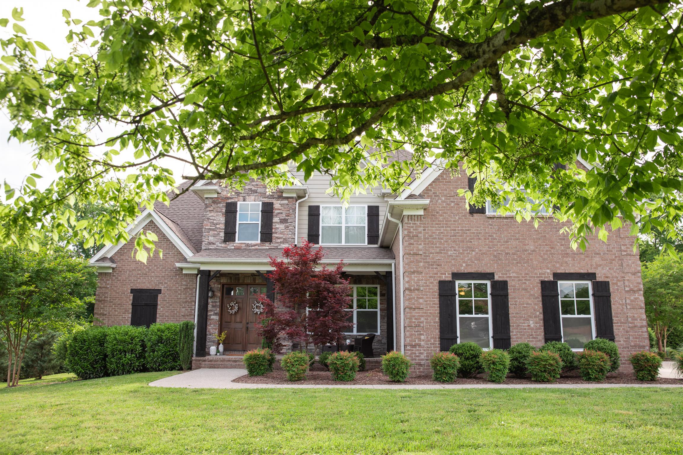 4309 Gallant Ridge Drive Franklin, TN 37064 - Photo 1 of 30 The first home available in Gallant Ridge in nearly 4 years!! This is your chance... Front view shows the large front porch, stone accents, landscaping and details of construction. Custom Built by Gregg & Rains in 2014.