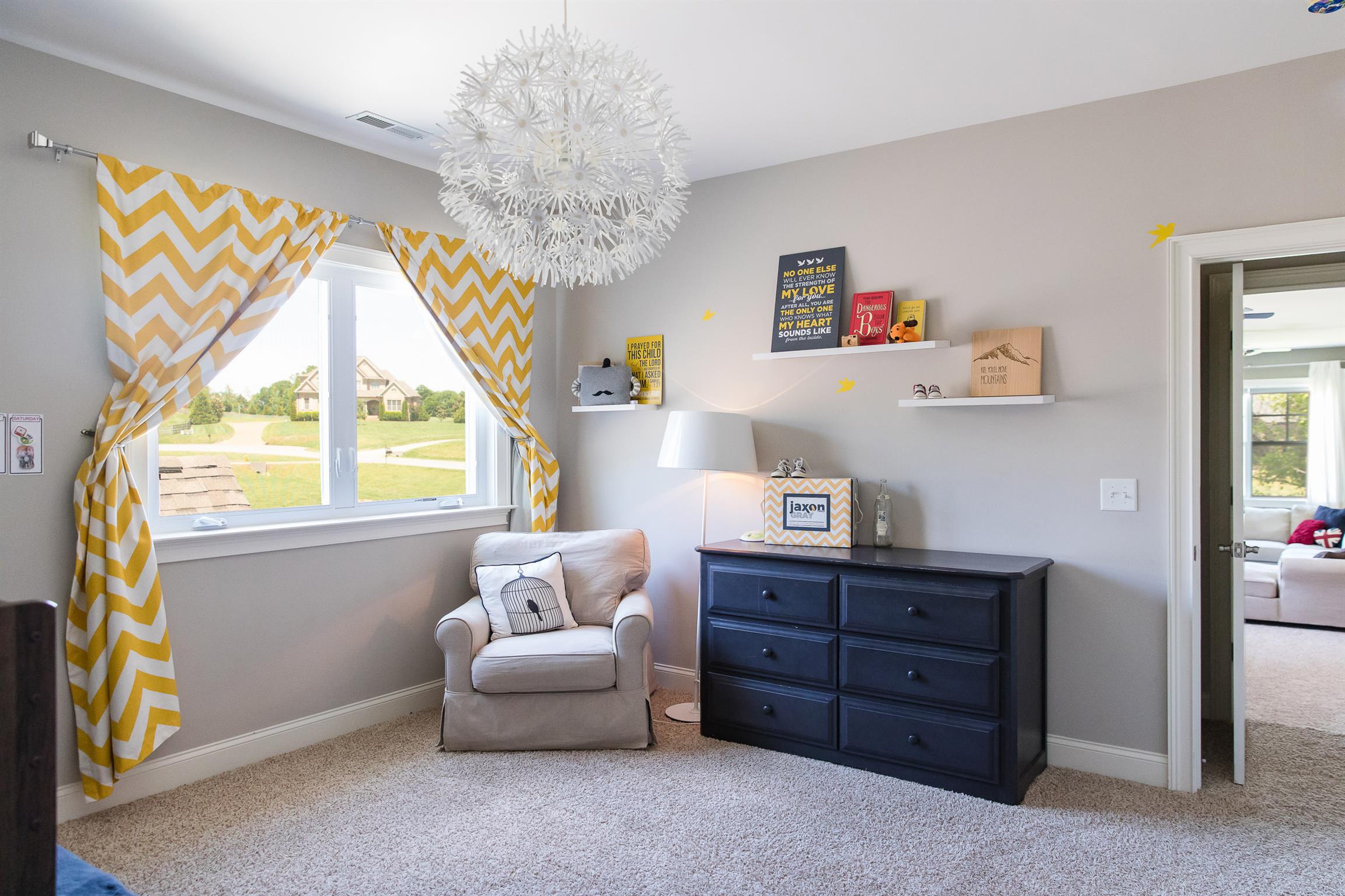 4309 Gallant Ridge Drive Franklin, TN 37064 - Photo 13 of 30 All bedrooms have fun light fixtures, custom closets with solid shelving & storage options, and good proportions. There is no wasted space in this home. Each room flows seamlessly to the next...