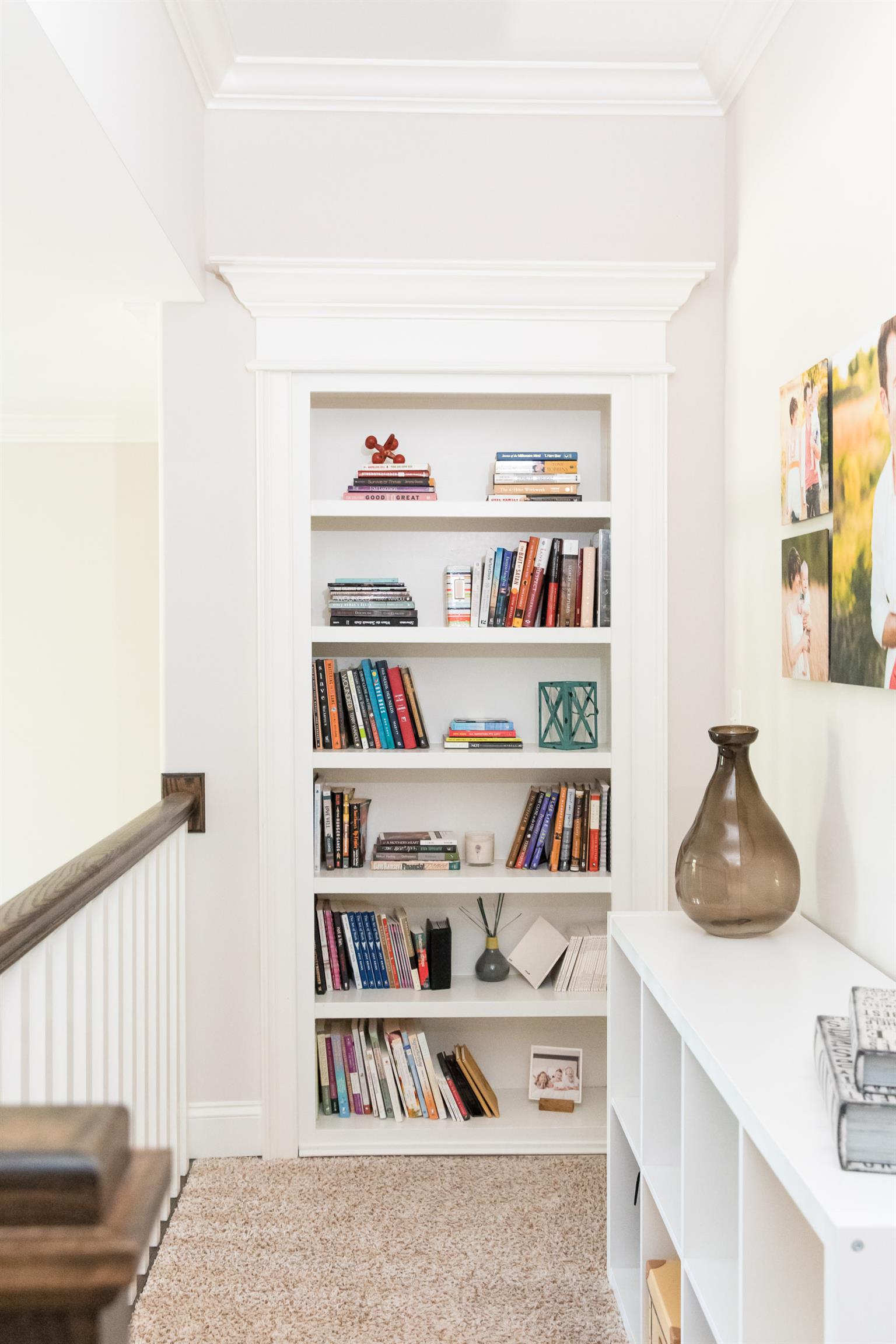 4309 Gallant Ridge Drive Franklin, TN 37064 - Photo 15 of 30 Upstairs hallway with beautiful built-in bookcase ... also a secret door that swings open to one of 2 bonus/theater rooms!