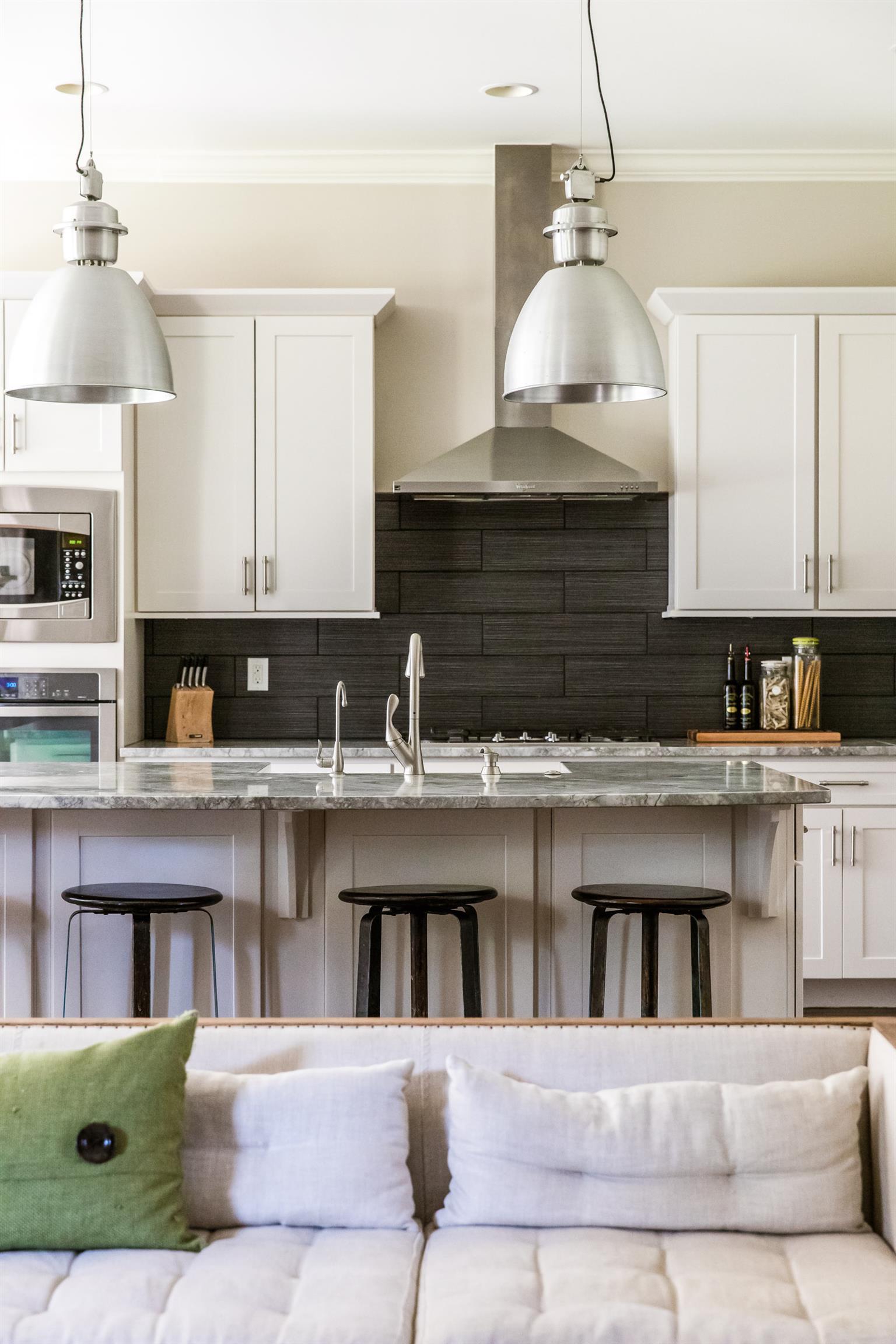 4309 Gallant Ridge Drive Franklin, TN 37064 - Photo 5 of 30 The kitchen finishes are clean and crisp... So many wonderful vignettes throughout this home. breakfast bar makes the layout so perfect for family or social gatherings. There is space for everyone.