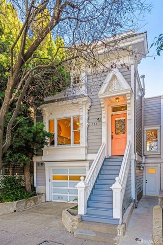 a view of a brick building with many windows