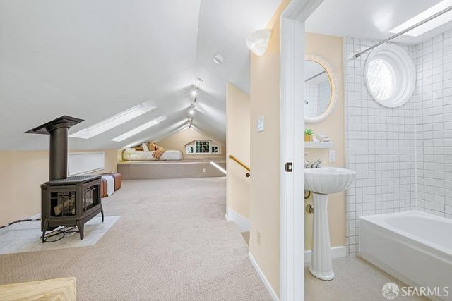 a bathroom with a sink a bathtub and a shower