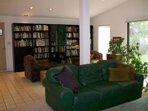 4 Carol Road Marblehead, MA 01945 - Photo 7 of 15 a living room with furniture and a book shelf