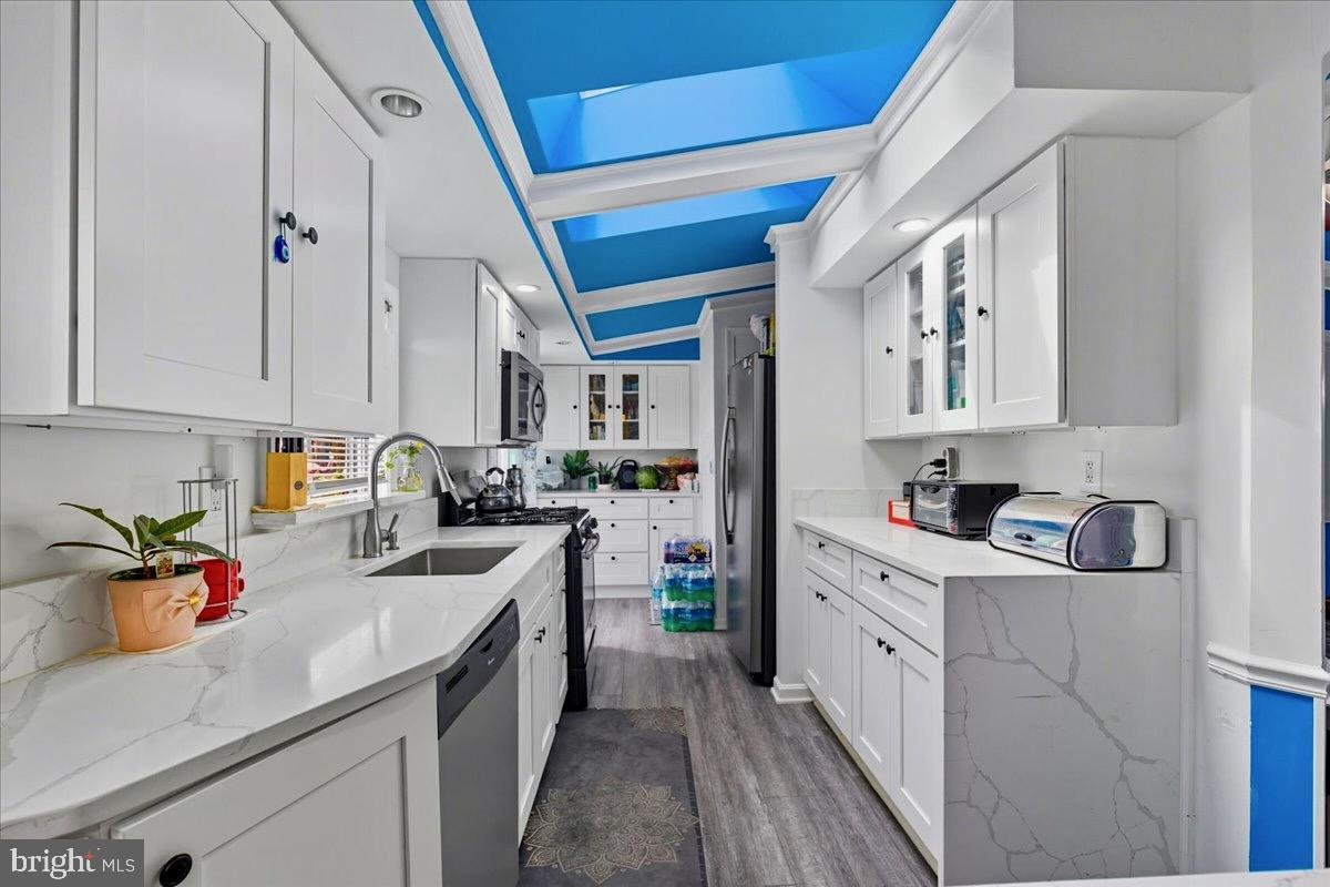 Fully renovated with quartz waterfall countertops.