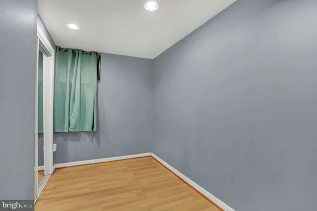 a view of a storage and utility room with washer and dryer