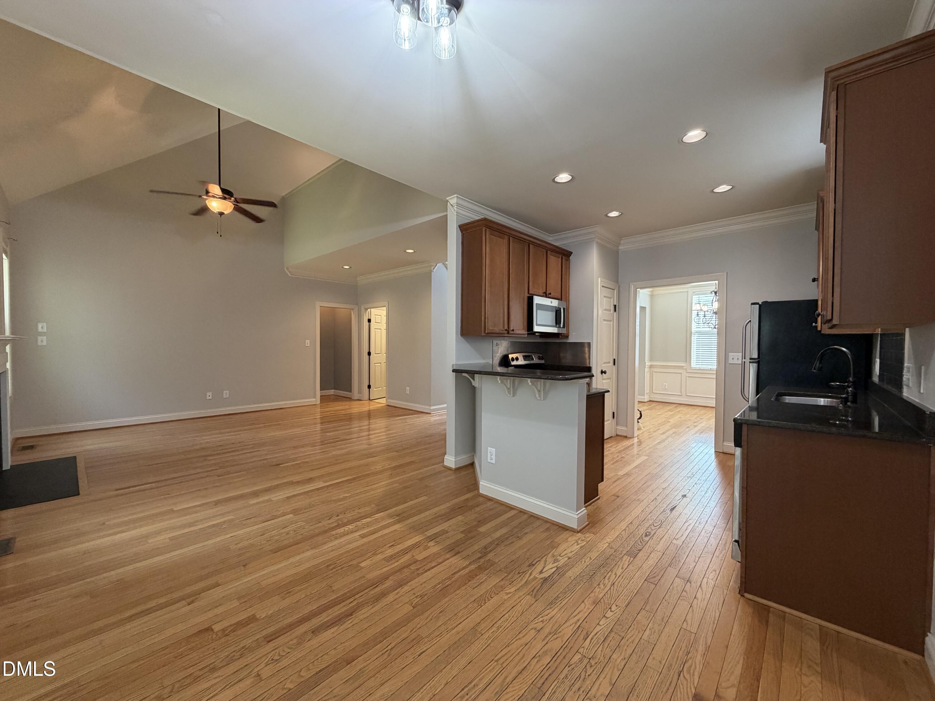 204 Blair Hills Road Wendell, NC 27591 - Photo 15 of 52 a view of kitchen with cabinets appliances and wooden floor