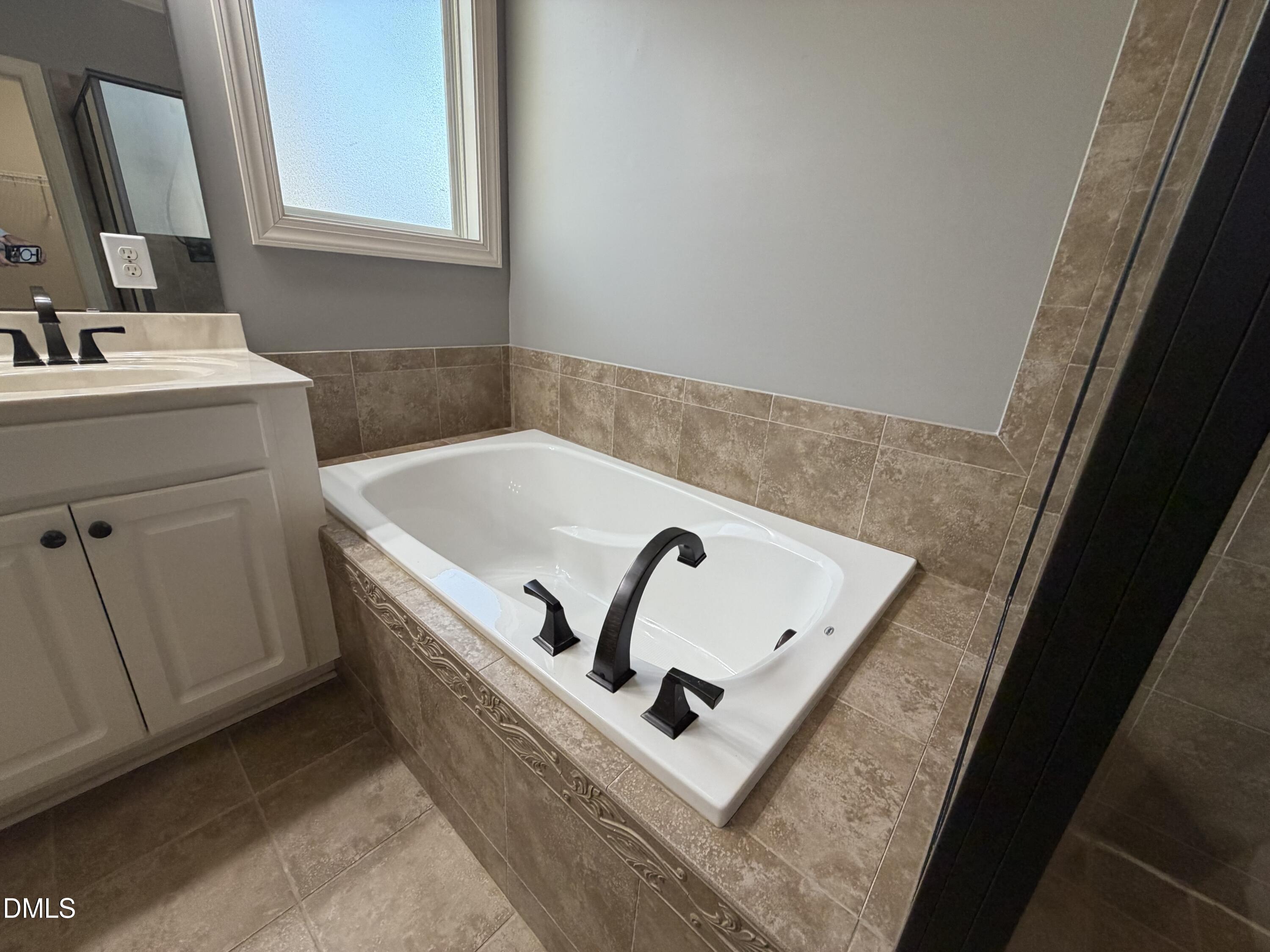 204 Blair Hills Road Wendell, NC 27591 - Photo 28 of 52 a view of kitchen sink washer and dryer