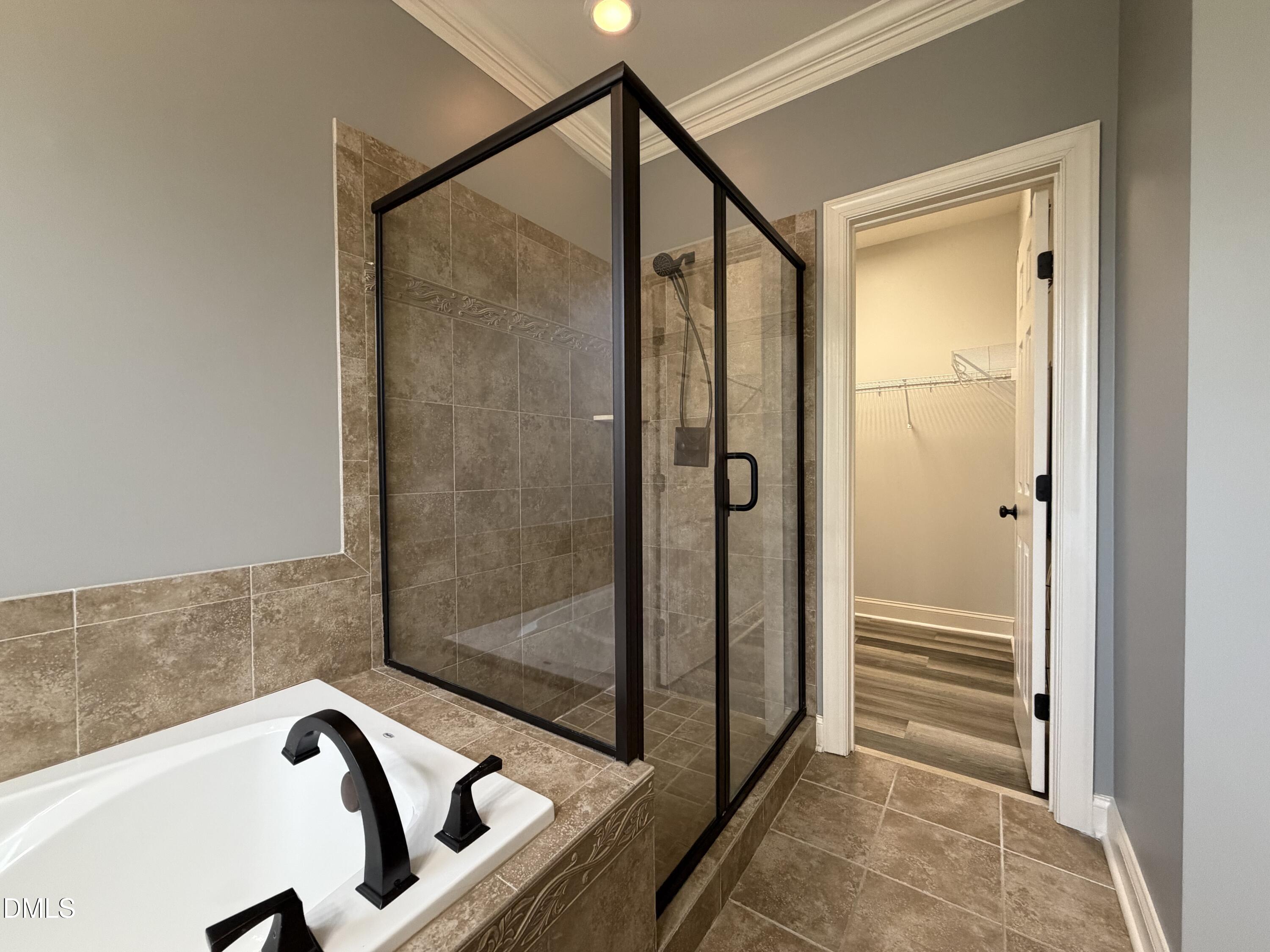 204 Blair Hills Road Wendell, NC 27591 - Photo 29 of 52 a bathroom with a shower and a bathtub